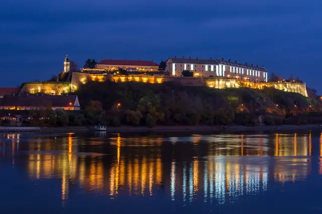 Day trips from Belgrade sunset over Danube River Petrovaradin Novi Sad fortress medieval castle luxury car tour