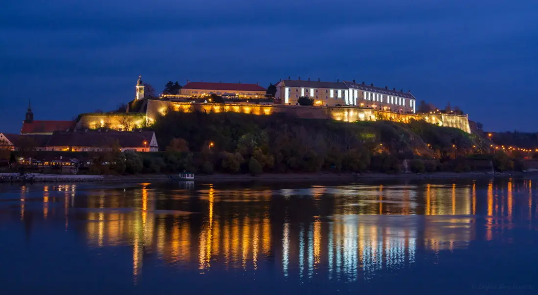 Day trips from Belgrade sunset over Danube River Petrovaradin Novi Sad fortress medieval castle luxury car tour