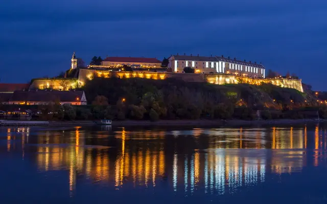 Day trips from Belgrade sunset over Danube River Petrovaradin Novi Sad fortress medieval castle luxury car tour