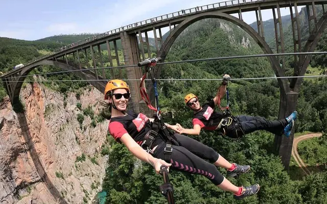 Corporate team building activities outdoor adventure Serbia with luxury group transport