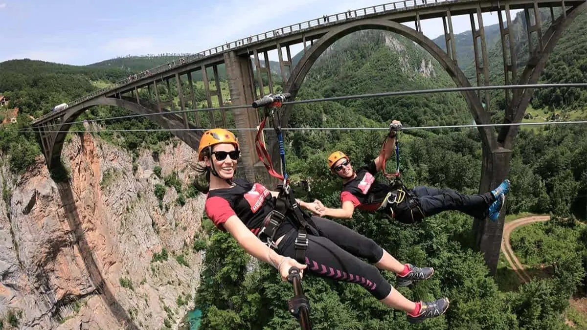 Corporate team building activities outdoor adventure Serbia with luxury group transport